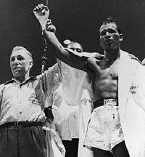 Brother Robinson is declared the winner of the Feb. 14, 1951 "Valentine's Day Massacre" middleweight championship bout against Jake LaMotta.