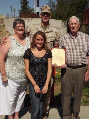 Brother Flowers and his family at his military promotion ceremony