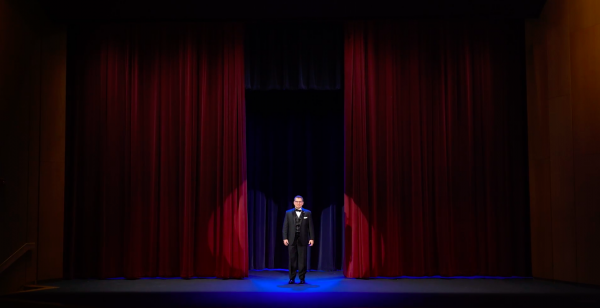 Executive Director and Host Michael Russell Opens the Event On Stage at Headquarters